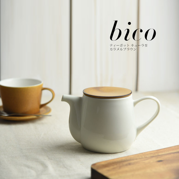 Close-up of a stainless steel tea strainer inside the Miyama Bico Series teapot, showcasing its fine mesh and fit within the teapot.