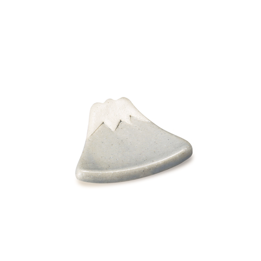 A speckled grey ceramic chopstick rest, shaped like Mount Fuji, isolated on a white background.
