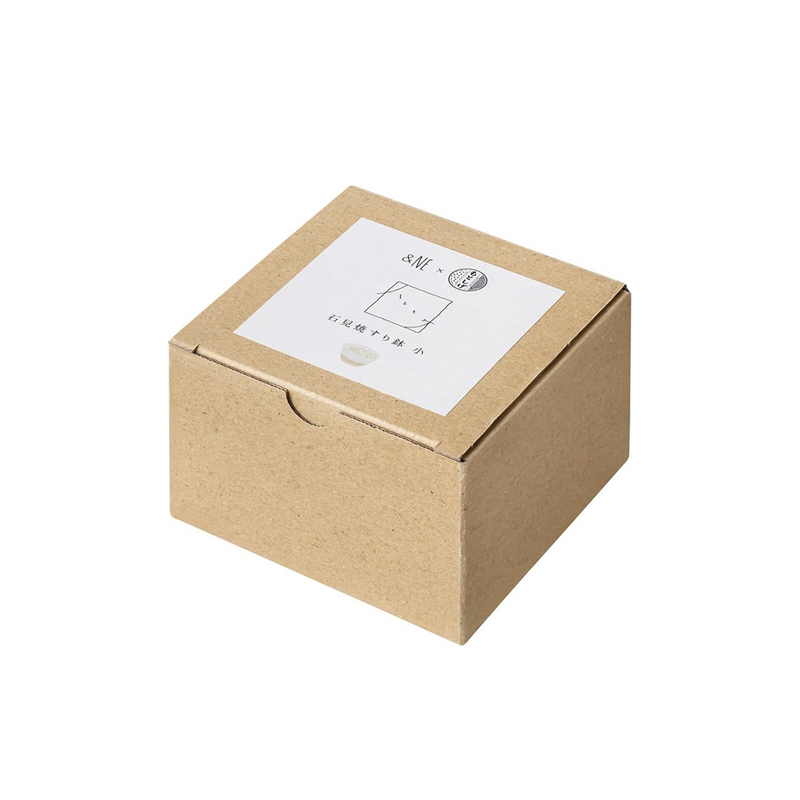 Kraft paper box with a white label on a white background