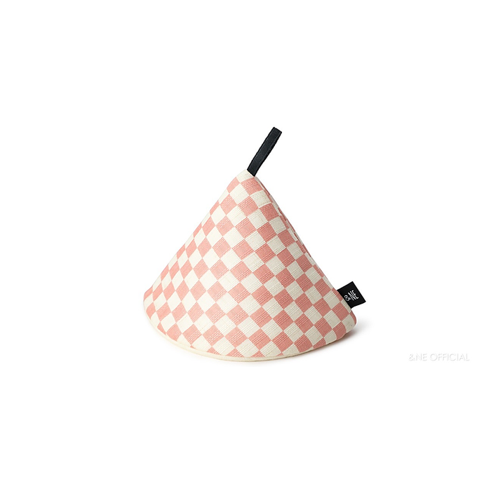 The &NE pot holder displayed in a light pink checkered pattern, triangular in shape with a black loop for hanging, isolated against a plain white background.