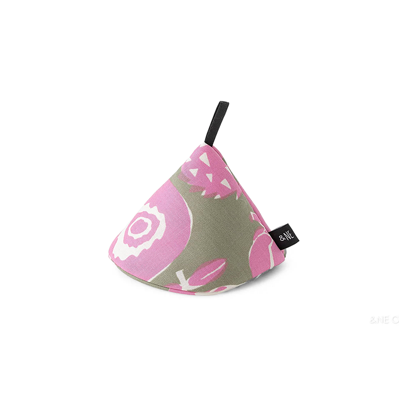 The &NE cone-shaped Japanese pot holder, featuring a playful abstract vegetable pattern in pink, white, and olive green.
