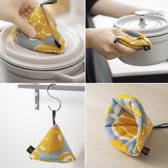 Composite image of a &NE Japanese Pot Holder in a yellow and blue pattern, showcasing various uses: adjusting a slow cooker's lid, being handled near a stove, hanging from a kitchen hook, and resting on a surface, illustrating its versatility and stylish design in a kitchen setting.