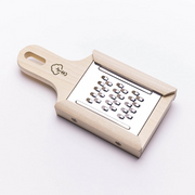 Oyanagi Sangyo Wooden Sasagaki Slicer with natural magnolia wood frame and stainless steel grater surface, shown against a white background.