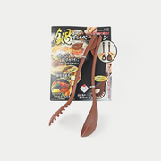 Brown Pearl Life dual-use magnetic cooking tongs, which separate into a pasta fork and a ladle, shown against its Japanese retail packaging.
