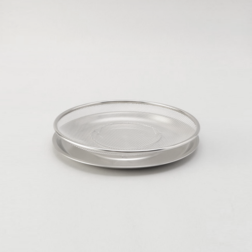 The two-piece Ryoumiya stainless steel set, featuring a round fine-mesh strainer resting neatly on top of its matching solid serving tray.

