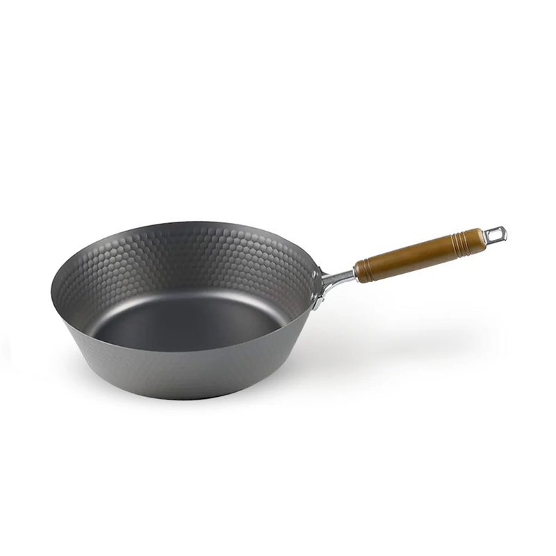A Pearl Life hammered nitrided carbon steel induction wok, 28cm, with a distinctive hammered pattern on its dark grey surface and a light brown wooden handle, shown against a white background.

