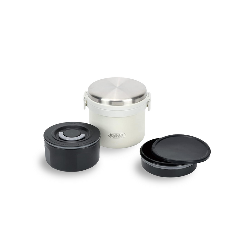 The Pearl Life Home Label Insulated Bento Box, showing the white outer container, the stainless steel lid, and the two separate black inner containers with their lids.