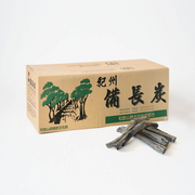 A product image of the 15KG box of Premium Kishu Binchotan, with several pieces of the authentic Japanese white charcoal displayed in front.

