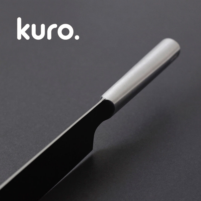 Close-up of a Remy Kuro Japanese Santoku knife with a sleek, minimalist design, featuring a smooth metal handle and a matte black blade, set against a dark background with the logo 'kuro.' prominently displayed.