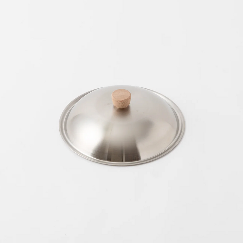 River Light 28cm stainless steel lid with a natural wooden knob handle, photographed against a white background.







