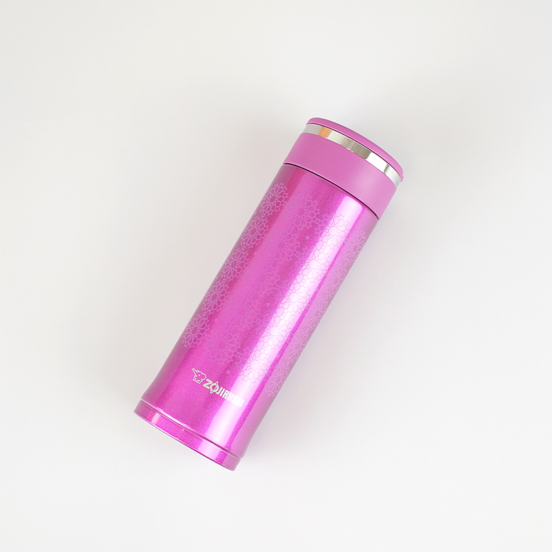 Pink thermos bottle with a silver cap on a white background
