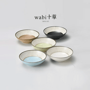 Close-up of Sango Wabi Tokusa Japanese Bowl, showcasing intricate brushwork and glossy finish.