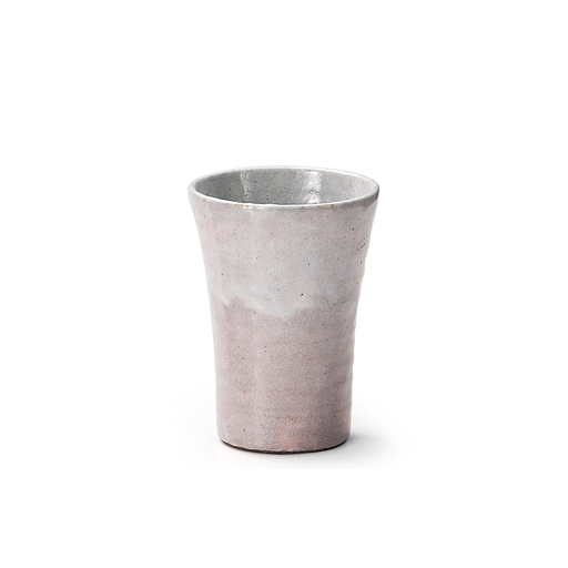 Muted pink Shino Yaki Japanese Shochu Cup with natural speckles.