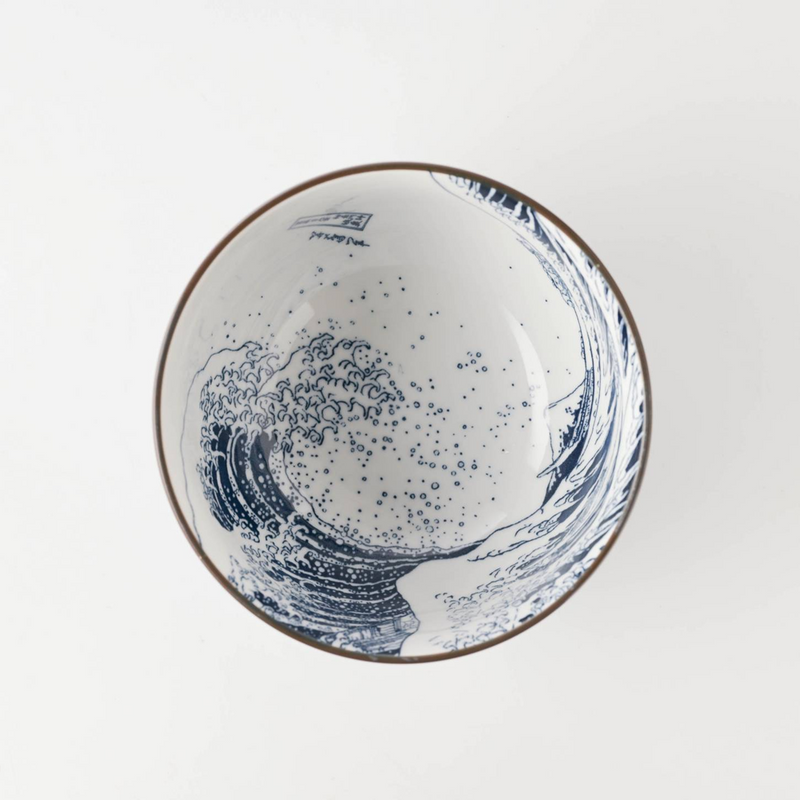 A top-down view of the Showa Seito 'The Great Wave' Japanese bowl, showing the full Hokusai artwork on the white porcelain interior.