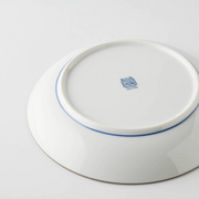 The underside of the Showa Seito plate, showing the blue maker's mark and 'JAPAN' stamp on the base.