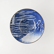 A top-down view of the Showa Seito Soba Bowl, showing the iconic 'Great Wave off Kanagawa' and Mount Fuji artwork inside.
