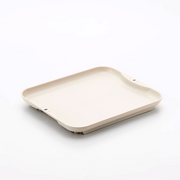 A Sugiyama Kinzoku Defrosting Tray in a light cream colour, shown at an angle on a white background.
