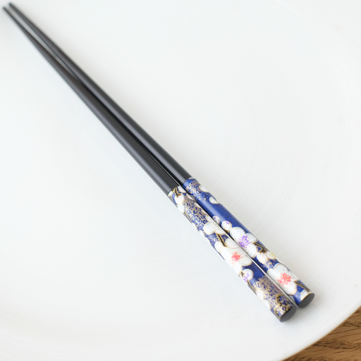 A pair of 22.5cm black Japanese chopsticks featuring a 'Washi Kanbai' design with gold, blue, and white plum blossom patterns on the handle.