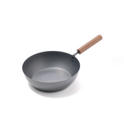 A product image of the Tanabe Kanagu 26cm Carbon Steel Wok, highlighting its unique octagonal wooden handle.

