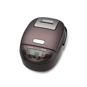 Tiger 5.5-cup IH pressure rice cooker (JPK-G10A) in a sleek dark bronze and black finish, shown on a clean white background.
