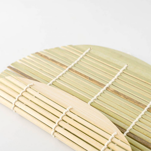 Bamboo mat with a grid pattern on a white background