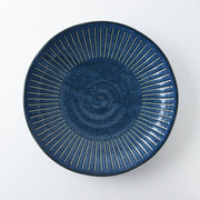 An overhead view of the Tokusa Indigo Dinner Plate (23cm) on a white background, showing the full radial striped pattern.
