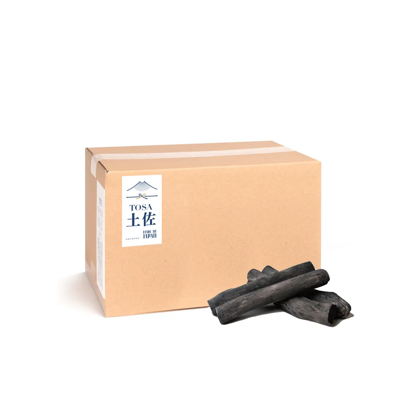 A product image of the 2KG box of Premium Tosa Binchotan, with several pieces of the authentic Japanese white charcoal displayed in front.

