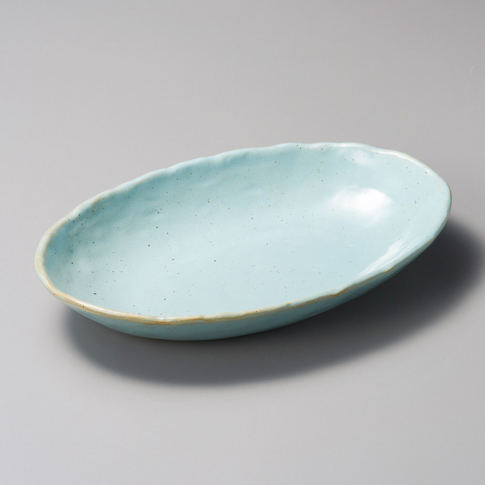 26cm oval bowl in serene turquoise, reminiscent of calm ocean waters.