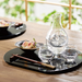 Toyo Sasaki Takasegawa Handmade Sake Set placed on a black lacquer tray with a Japanese meal, showing elegant table setting.