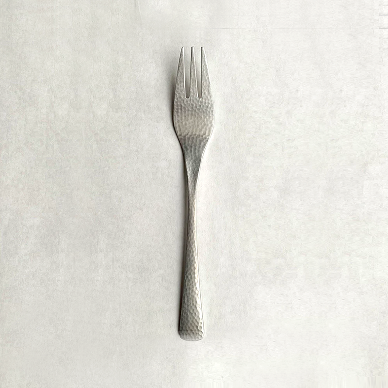 Nagomi Hammered Style Stainless Steel Dessert Fork (19cm) featuring a textured tsuchime finish across the handle and three tines.