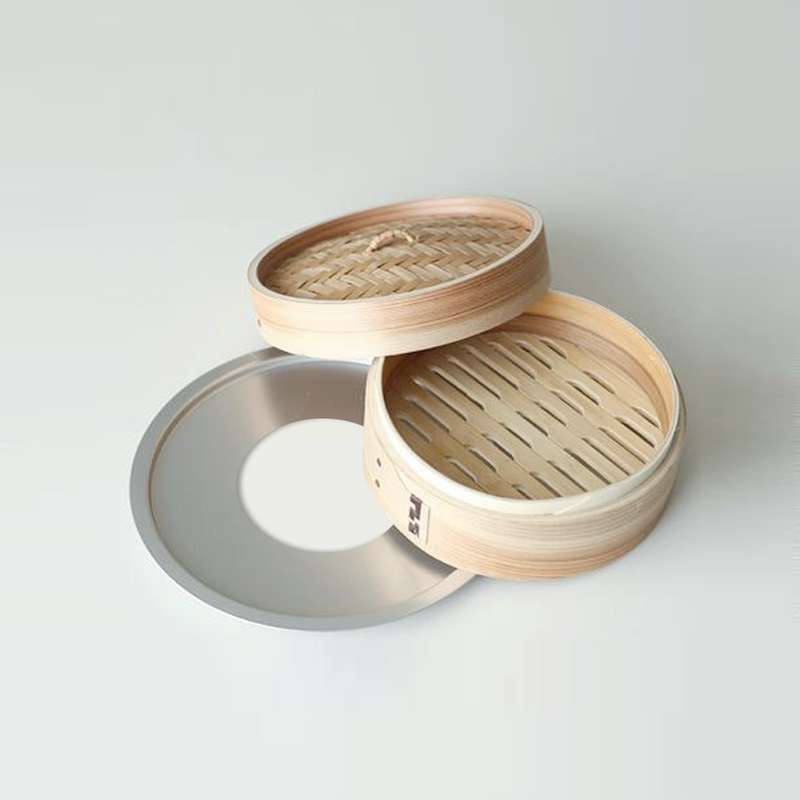 Tsubame Sanjo Stainless Steel Bamboo Steamer Adapter Ring featuring a flat, circular design with a 15cm central opening for steam distribution.