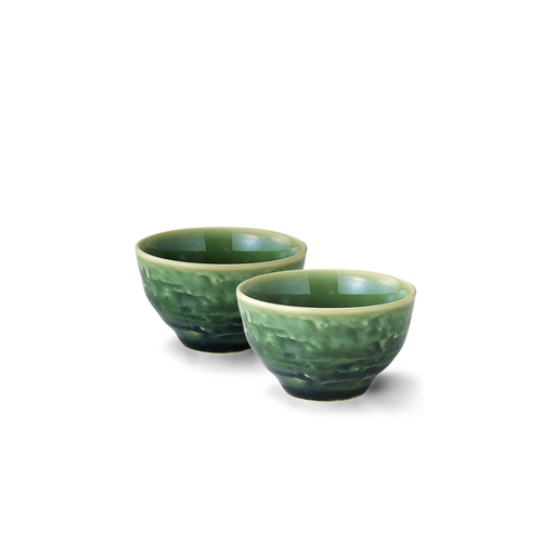 Set of two Yamaman Serenity sake cups, featuring a rich green colour with a textured, stone-like exterior and a smooth, lighter green interior. The cups are rounded and deep, ideal for enjoying traditional Japanese sake.