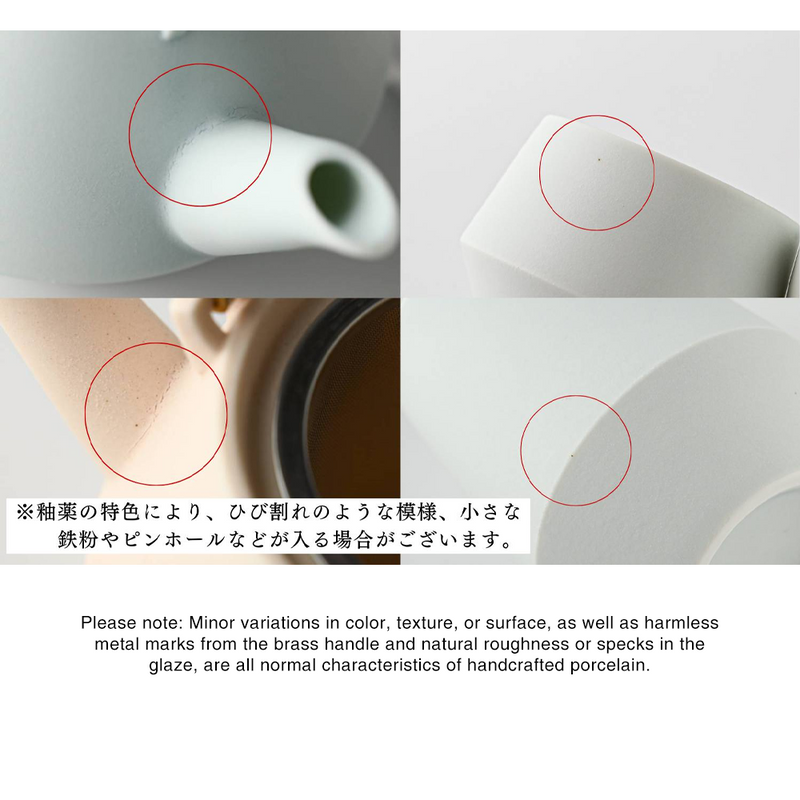 Yamatsu Frustum Japanese teapot spout and glaze detail with red circles indicating natural variations.

