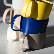 Yamatsu Moment mugs in yellow, blue and other colours
