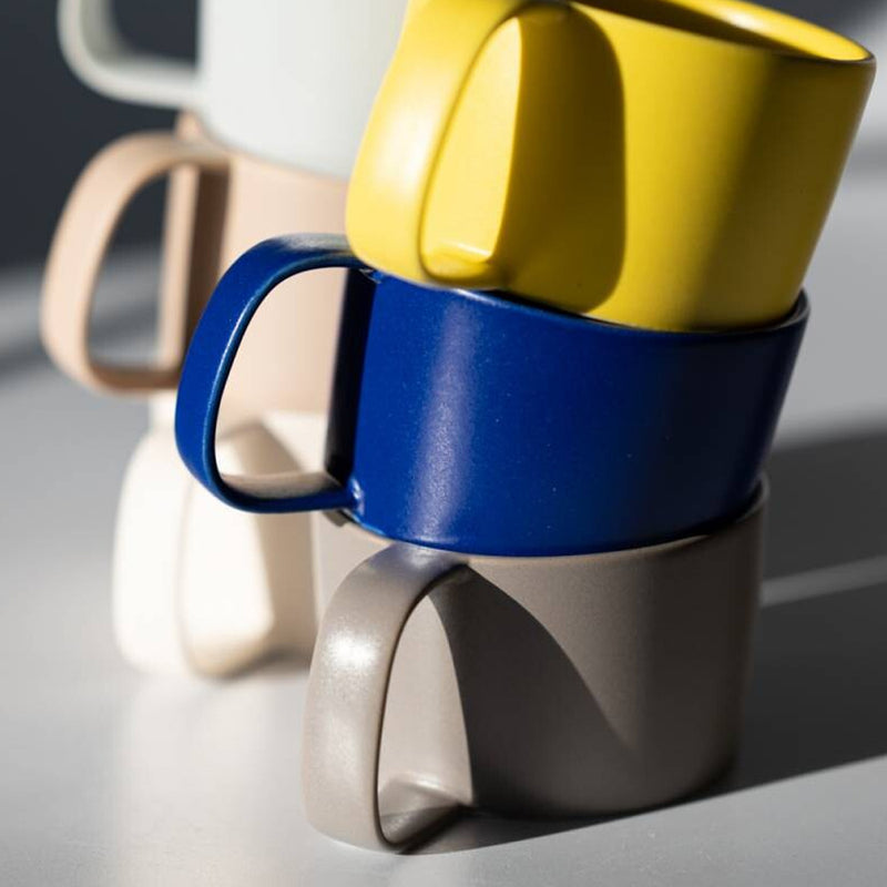 Yamatsu Moment mugs in yellow, blue and other colours