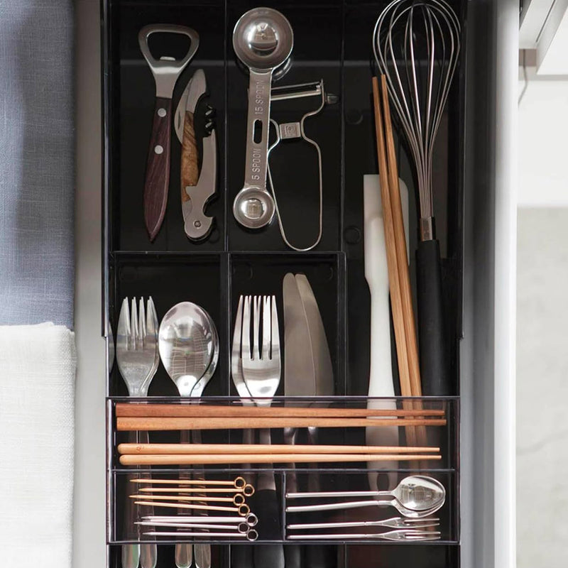 Black Yamazaki Tower cutlery tray extended to fit a wider drawer