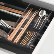 Black Yamazaki Tower expandable cutlery tray at its shortest setting