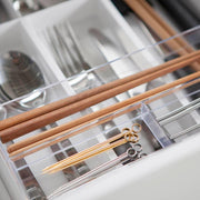Yamazaki Tower expandable sliding cutlery tray in white, showing the compartment layout