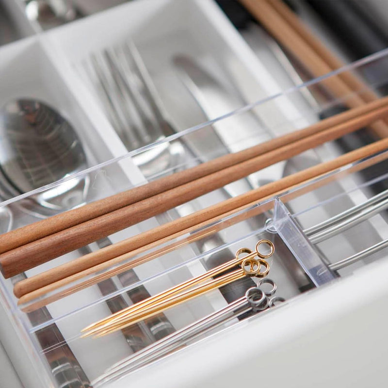 Yamazaki Tower expandable sliding cutlery tray in white, showing the compartment layout
