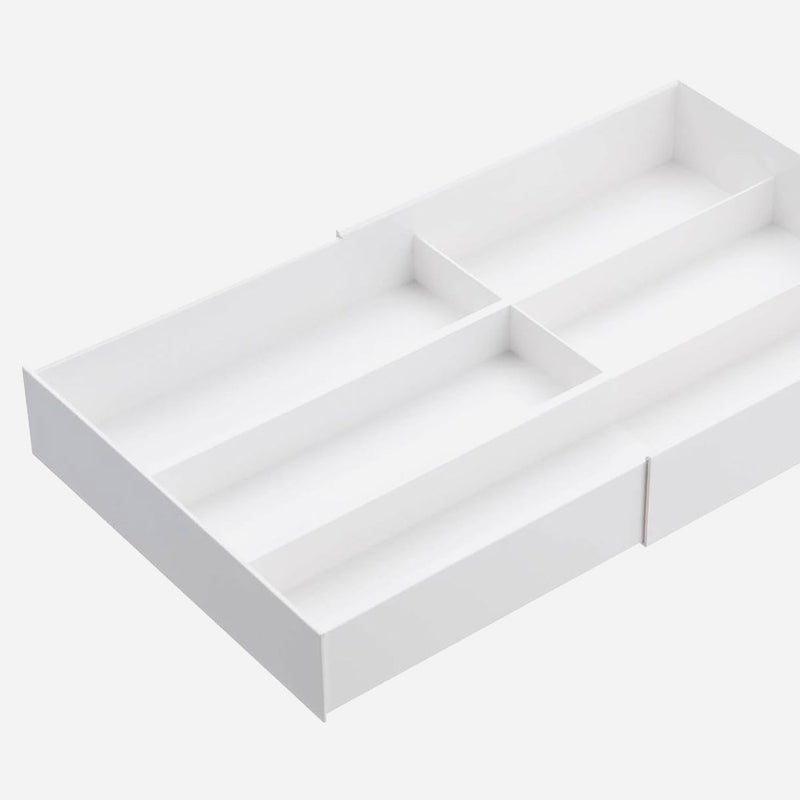 Clear sliding upper tray on the white Yamazaki Tower expandable cutlery tray