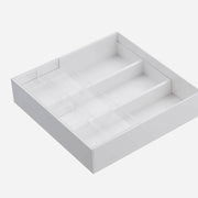 Undivided right pocket of the white Yamazaki Tower cutlery tray holding long kitchen tools