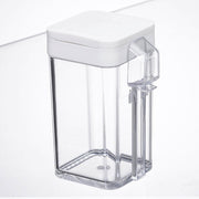 Yamazaki Tower flour and spice bottle in white with the sliding lid open on the smaller sprinkling opening