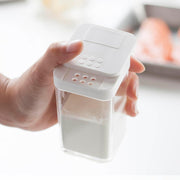 Yamazaki Tower flour and spice bottle in white with lid removed, showing the wide refill opening