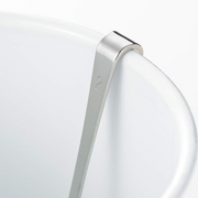 Close-up of the Yoshikawa spoon handle hooked securely onto the rim of a white container.