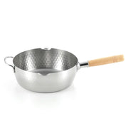 The Yoshikawa Yukihira stainless steel saucepan, showing its hammered finish, natural wood handle, and dual pouring spouts.