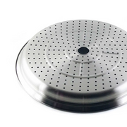 A close-up, angled view of the Yoshikawa Cook-Pal Stainless Steel Steamer - 36cm insert. It is a round, shallow, silver-coloured metal tray with many small, evenly spaced holes and a larger central hole.