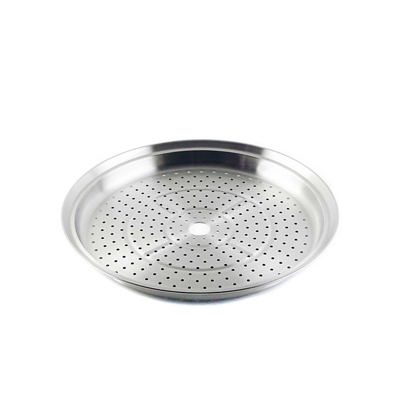 A close-up, angled view of the Yoshikawa Cook-Pal Stainless Steel Steamer - 36cm insert. It is a round, shallow, silver-coloured metal tray with many small, evenly spaced holes and a larger central hole.
