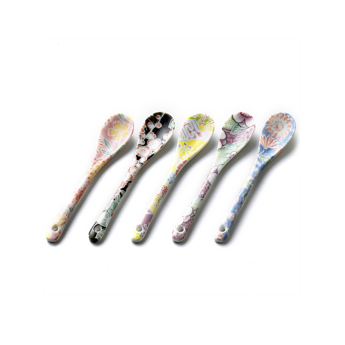 Five spoons with intricate floral designs laid out against a white background, showcasing traditional Yuzen patterns.