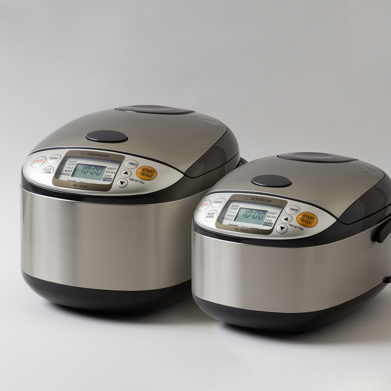 A size comparison of the Zojirushi MICOM Logic Rice Cooker, showing the 5.5-cup model next to the larger 10-cup model.

