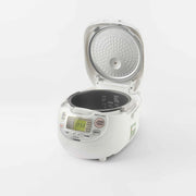 Zojirushi Neuro Fuzzy Rice Cooker NS-ZAQ10 with lid open, revealing inner pot and steam cap.

